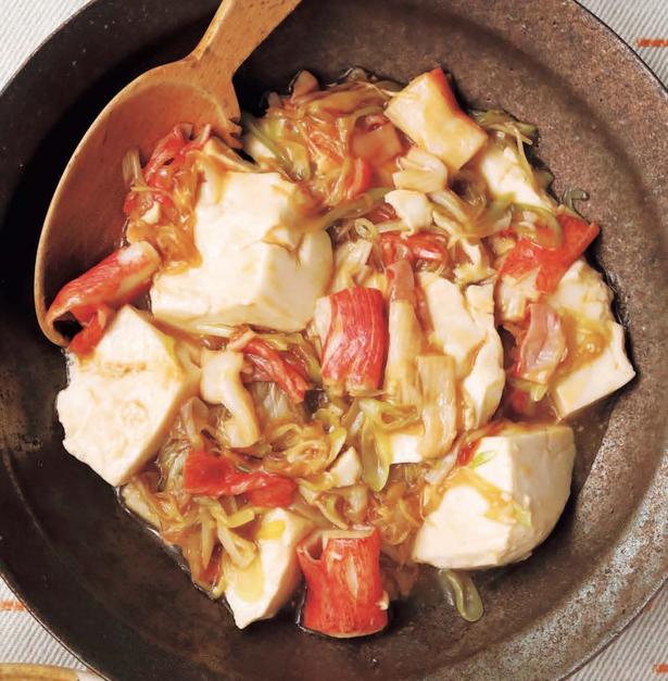 豆腐は大きめにすくい、つるりとした舌ざわりを楽しむ「豆腐とねぎのとろみ炒め」 レシピ考案/小田真規子　撮影/高杉純